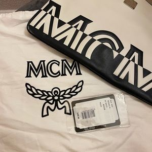 Black and white leather MCM clutch
